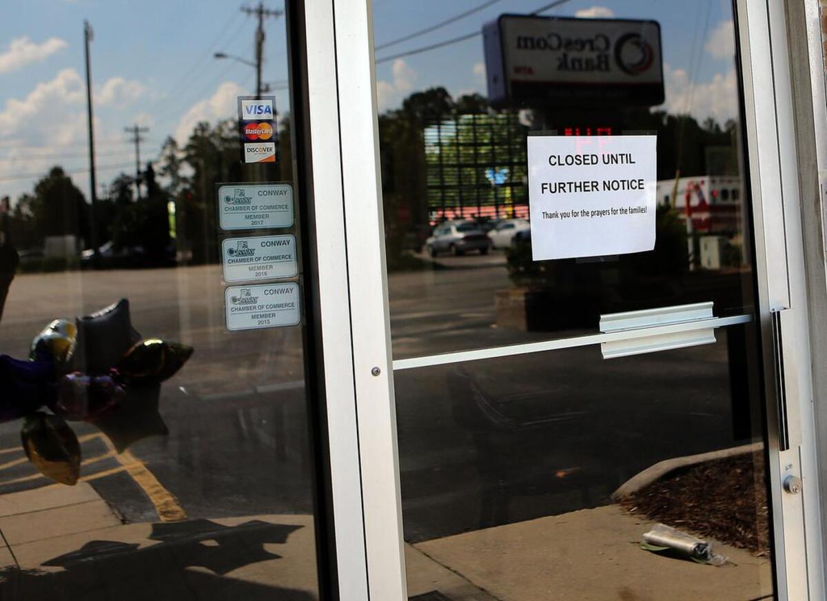 The CresCom Bank off 16th Avenue in Conway is closed on Wednesday, Aug. 23, 2017, with a sign posted that reads, “Closed until further notice. Thank you for the prayers for the families!” Two bank employees were killed in a robbery at the bank on Monday. The victims are Kathryn “Katie” Davis Skeen, 36, and Donna Major, 59. The suspect in the robbery, Brandon Michael Council, has been arrested in Greenville, N.C., and faces two counts of murder, among several other charges. He is also wanted for felony common law robbery after a bank robbery in Wilson on Aug. 10, 2017.