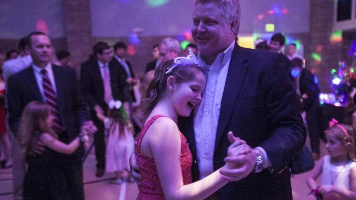 Drew Streett dances with 10-year-old Drew during the Belin Methodist Church’s annual Daddy-Daughter Dance.