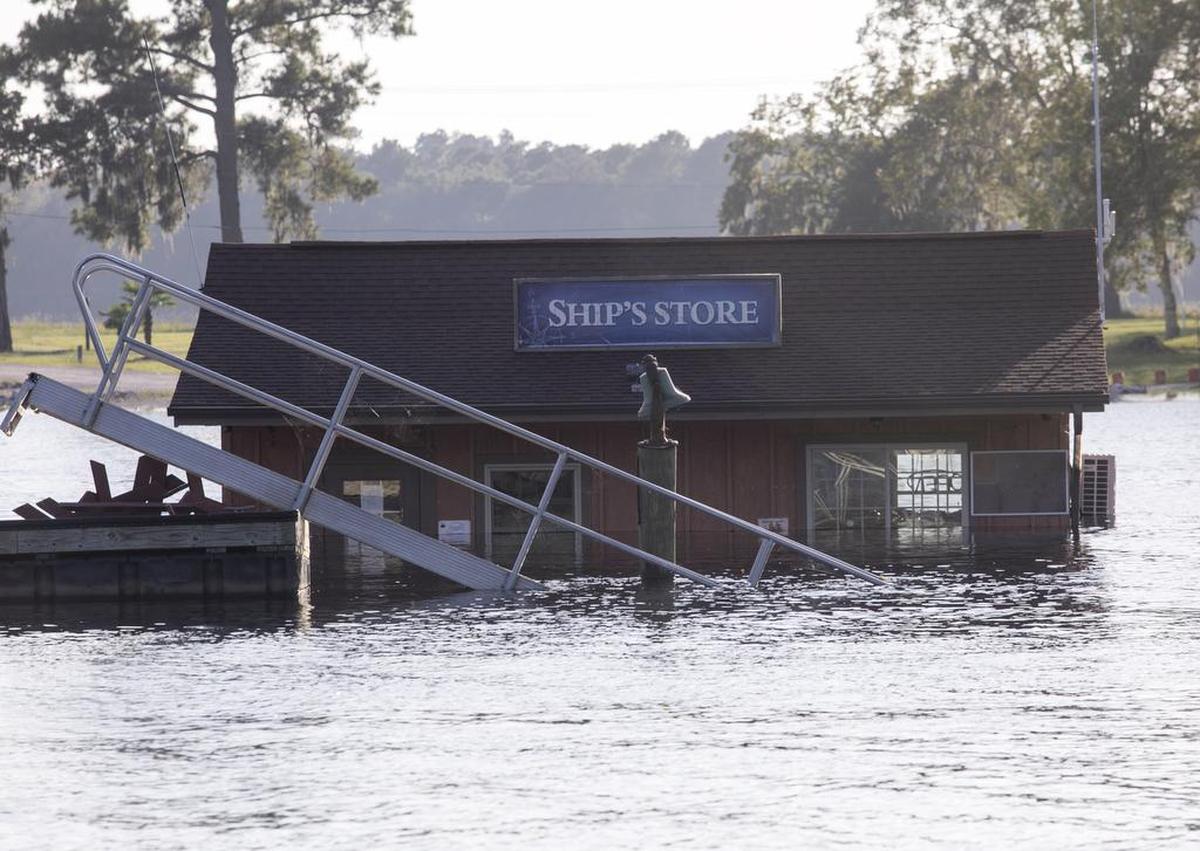 The Bucksport Marina store is flooded while boats float higher than the level of the buildings. The Waccamaw River at Conway crested Wednesday at well over 21 feet flooding many downtown homes. Wednesday, Sept. 26, 2018.