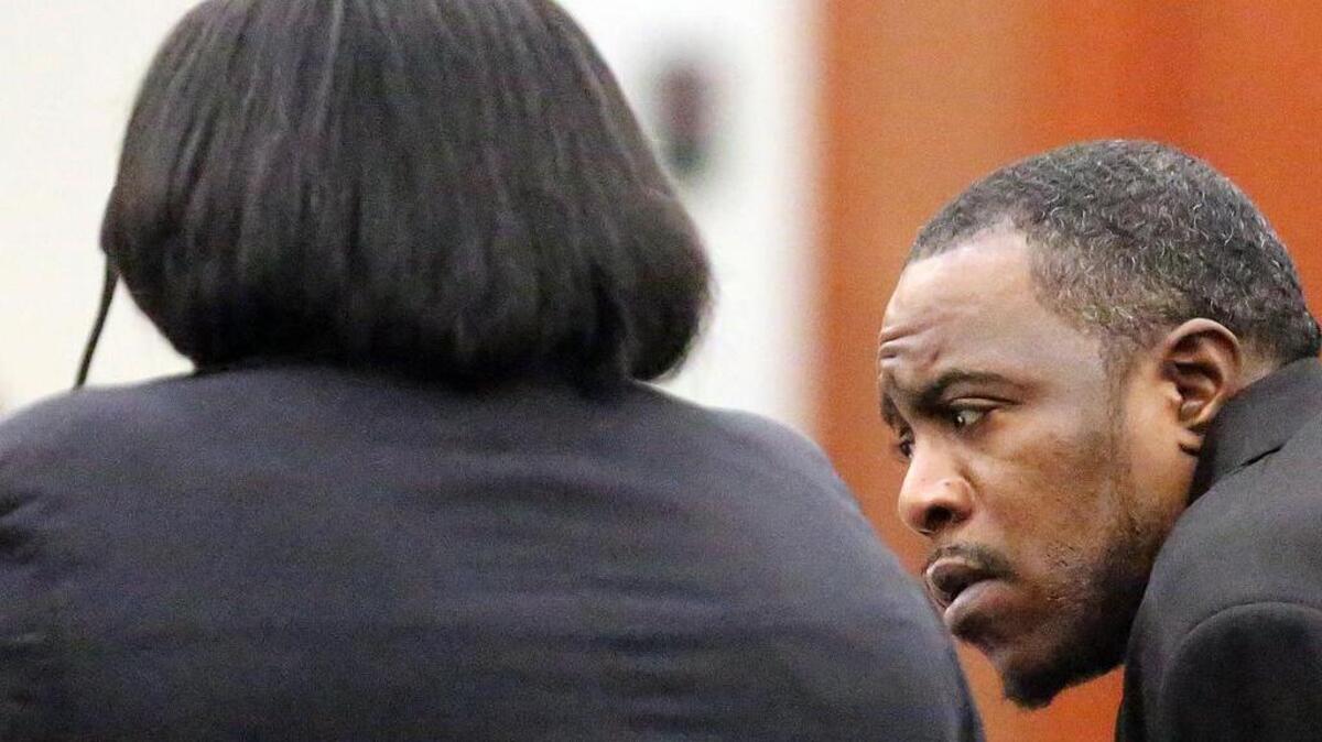 Kevin Tyrone Bryant talks to his attorney Kia Wilson during his murder trial at the Horry County Courthouse on Wednesday, Dec. 7, 2016. Wilson is representing Bryant. Bryant is accused of killing 23-year-old Saequan Vereen outside of Myrtle Beach's Club Levelz in February 2015. Bryant was shot and detained by security guards from the club. The club was located in the Superblock area of Myrtle Beach and it has since closed.