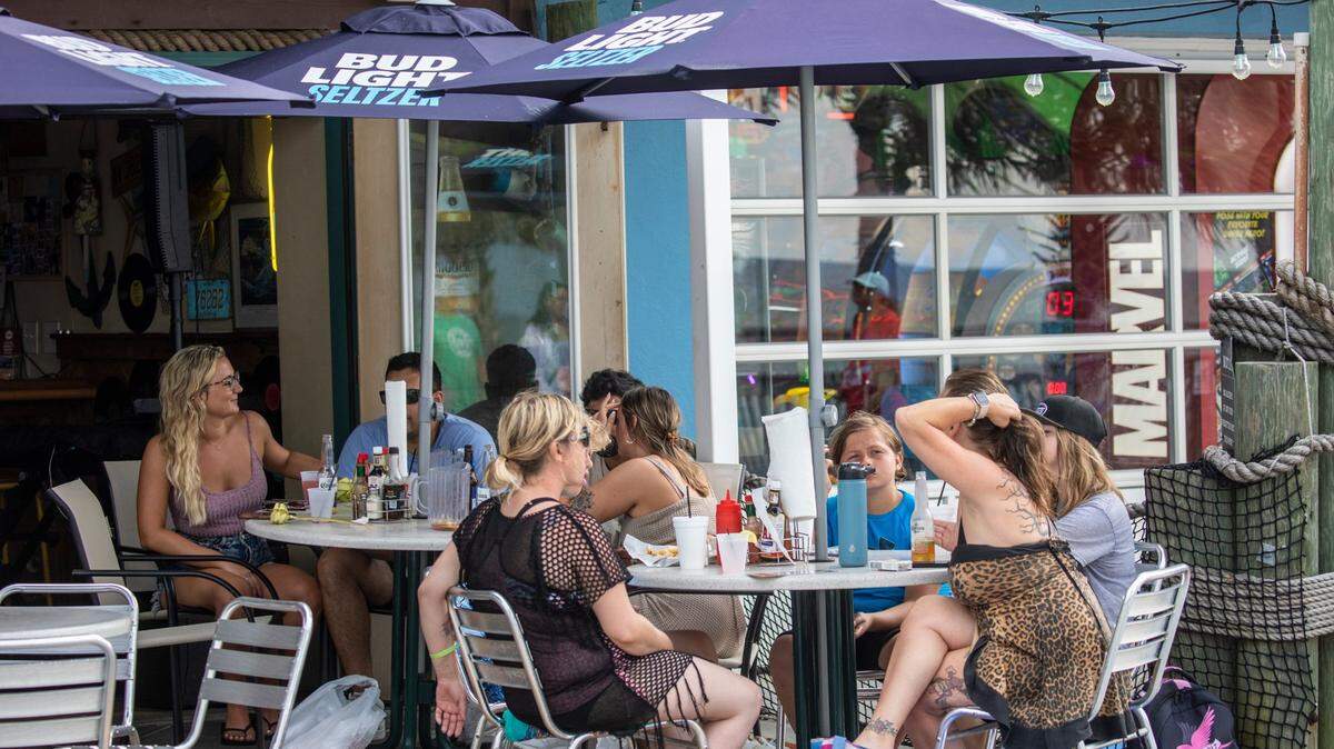 The Myrtle Beach Boardwalk is lined with outdoor seating for the many restaurants, cafes and bars. July 12, 2022.