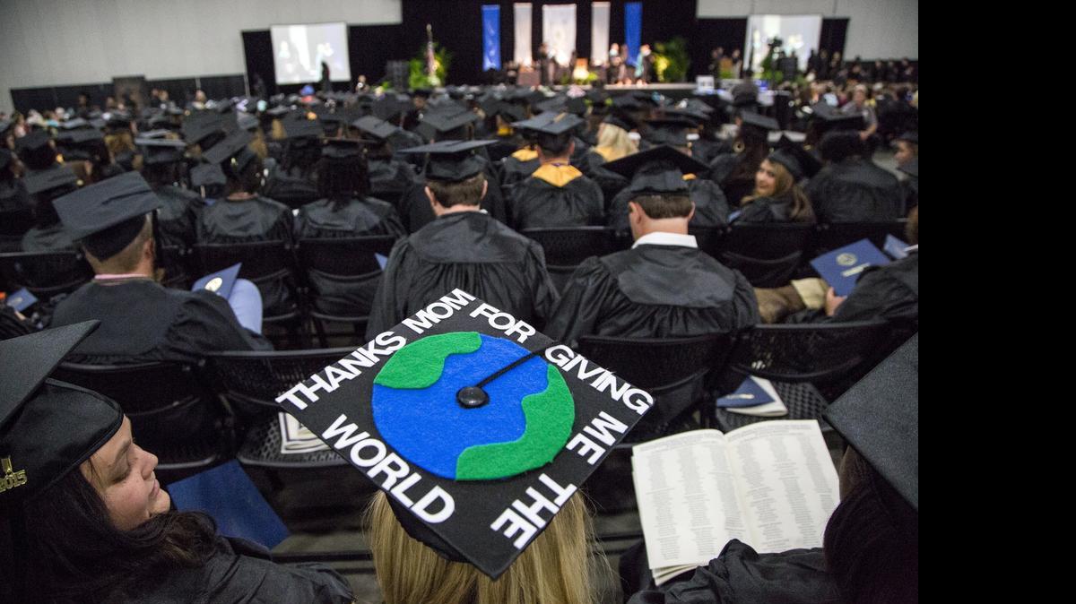 
Toni Strollo, getting an Associate Degree in General Business, wears a graduation cap with the words "Thanks Mom For Giving Me the World" crafted on top. Horry Georgetown Technical College's 2015 Spring Commencement is held at the Myrtle Beach Convention Center.
