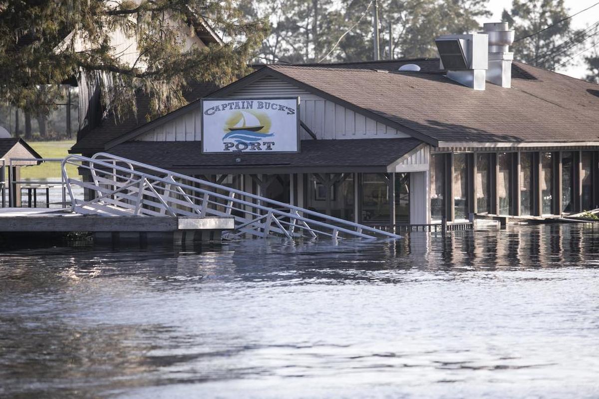 Captain Buck’s Port restaurant at the Bucksport Marina shows evidence of flooding on Wednesday. The Waccamaw River at Conway crested Wednesday at well over 21 feet flooding many downtown homes. Wednesday, Sept. 26, 2018.