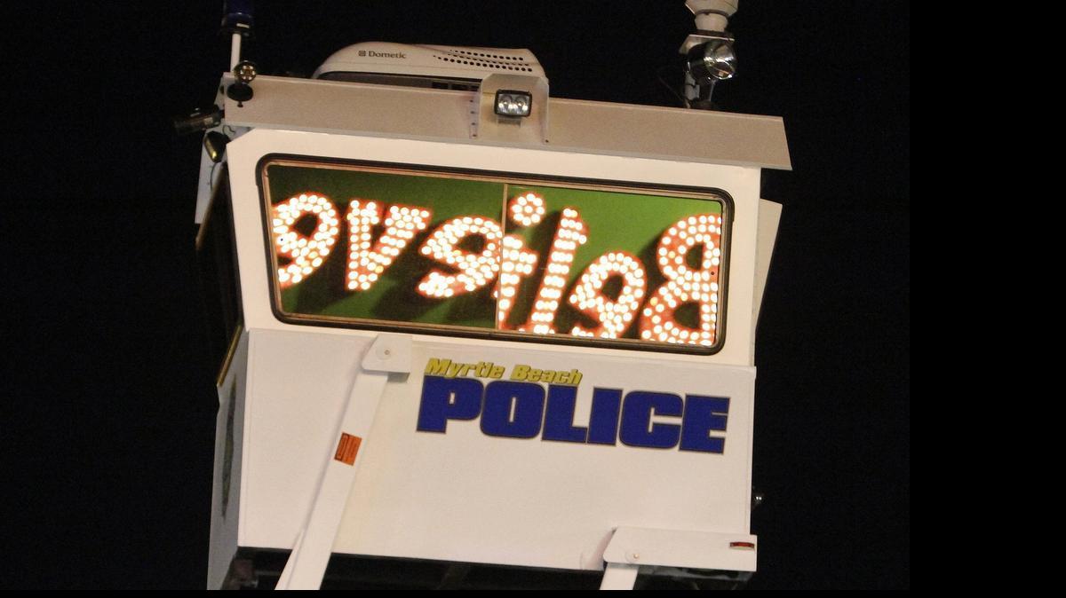 
Myrtle Beach Police SkyWatch stands over the crowd on Ocean Boulevard on Saturday, May 23, 2015, during Atlantic Beach Bikefest in Myrtle Beach.
