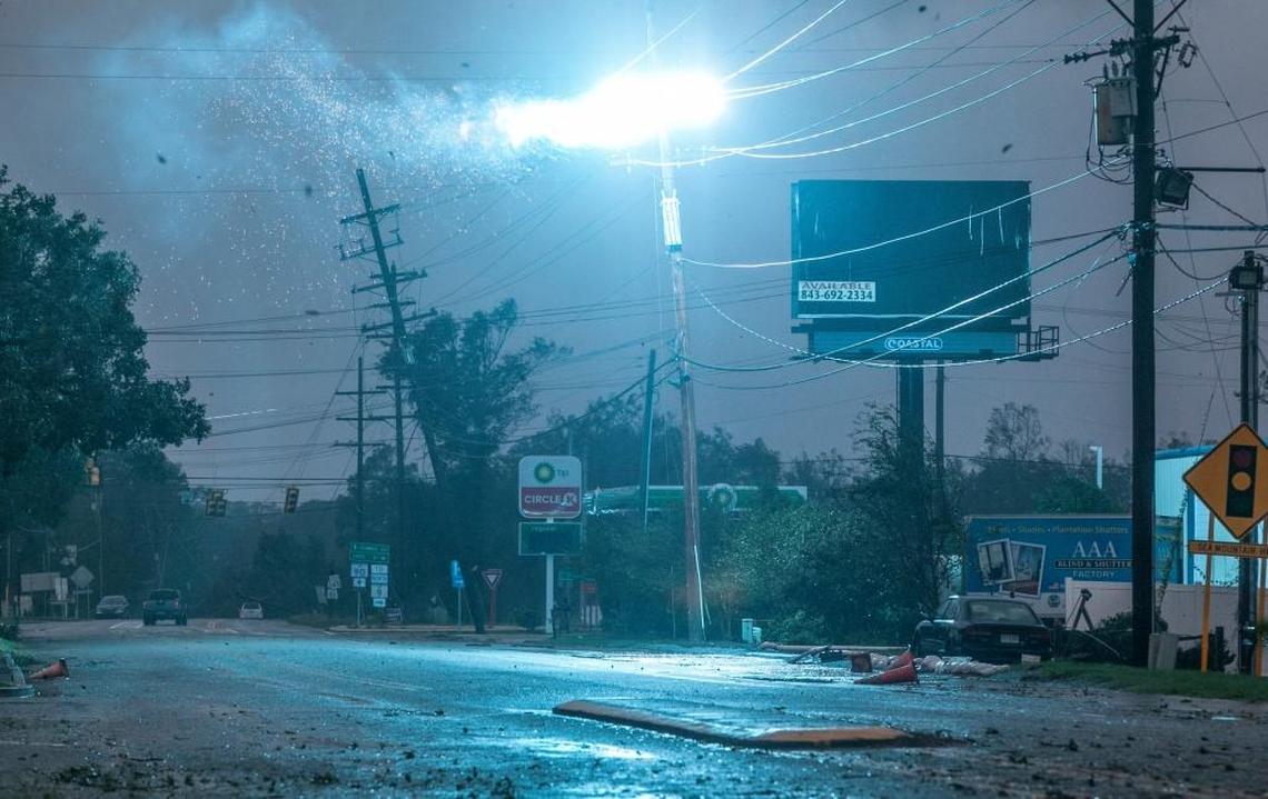 A vehicle was tangled in a downed power line which caused sparks to fly at Nixon's Crossroads on U.S. Hwy 90. Saturday, Oct. 8, 2016.