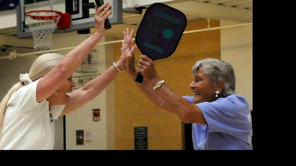 
Myrtle Beach could add a three-month gym membership option to give snowbirds and others in town for only a few months a break on the cost. Linda Hopkinson (L) celebrates a point with her mother, Rena Grant, a USAPA Ambassador during a game with Bill Smith, another Ambassador and Caroline Freese, Tuesday afternoon at Pepper Geddings Recreation Center. They were hosting Pickleball demonstrations and lessons to celebrate International Pickleball Week, Tuesday. 06/01/10 Photo by Charles Slate
