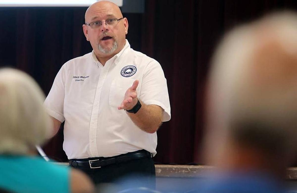 Horry County Emergency Management Director Randy Webster talks to the gathering in the “Know Your Zone” meeting at the Base Recreation Center on Aug. 10.