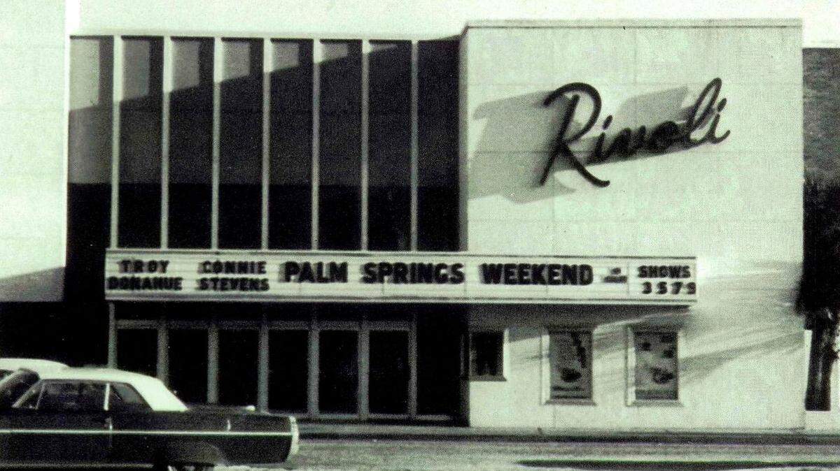This photo of the Rivoli Theatre facade from 1963 advertises for “Palm Springs Weekend,” starring Troy Donahue and Connie Stevens.