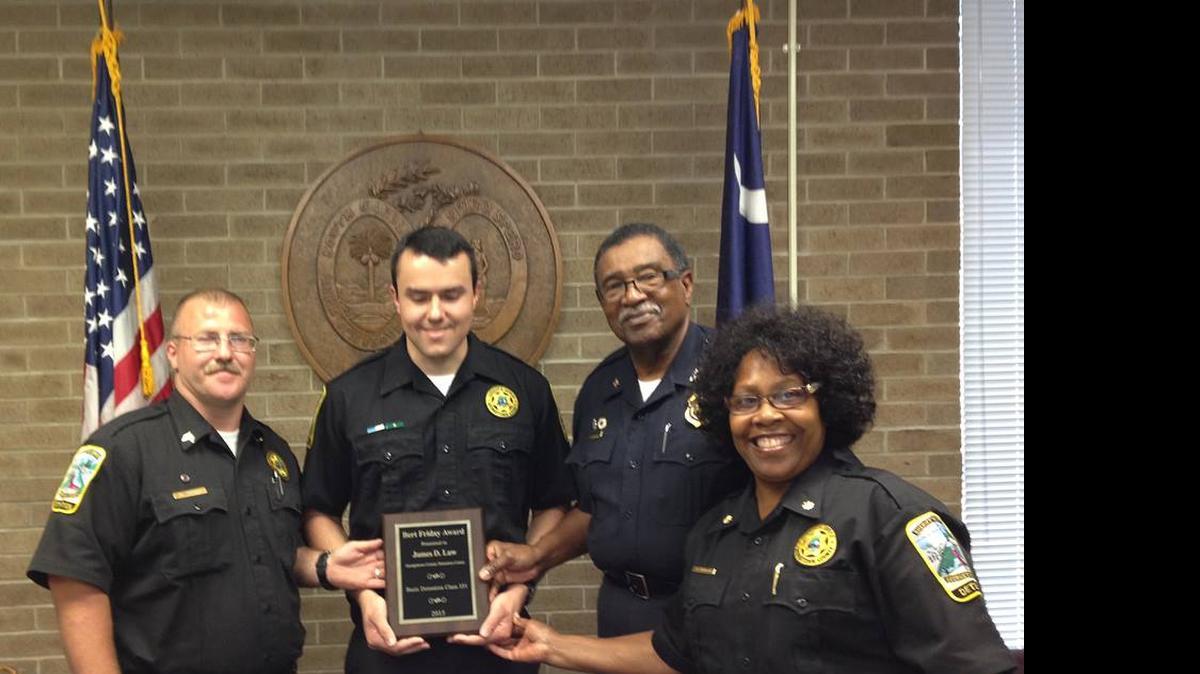 
James D. Law (center) was given the Bert Friday Award for high academic achievement at the basic jail training class at the S.C. Criminal Justice Academy. 
