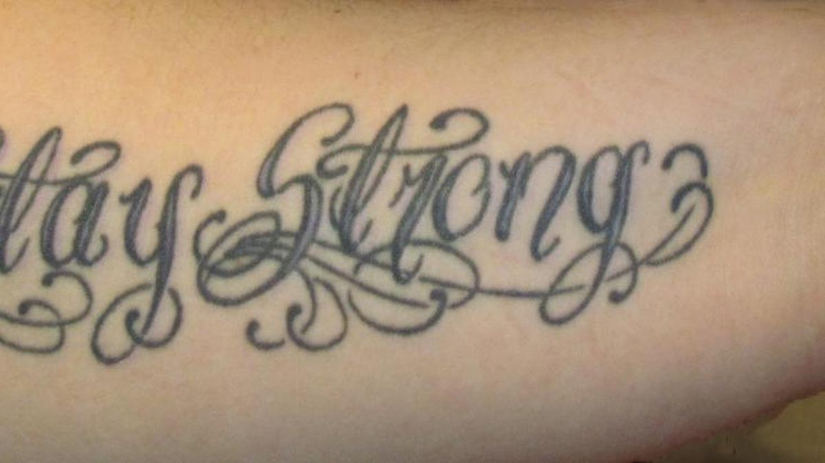 Nicole Swanson of Carolina Shores, N.C. displays her tattoo, “Stay Strong.” Swanson, who has spina bifida, shows her sense of humor saying, “I have the worst kind.”