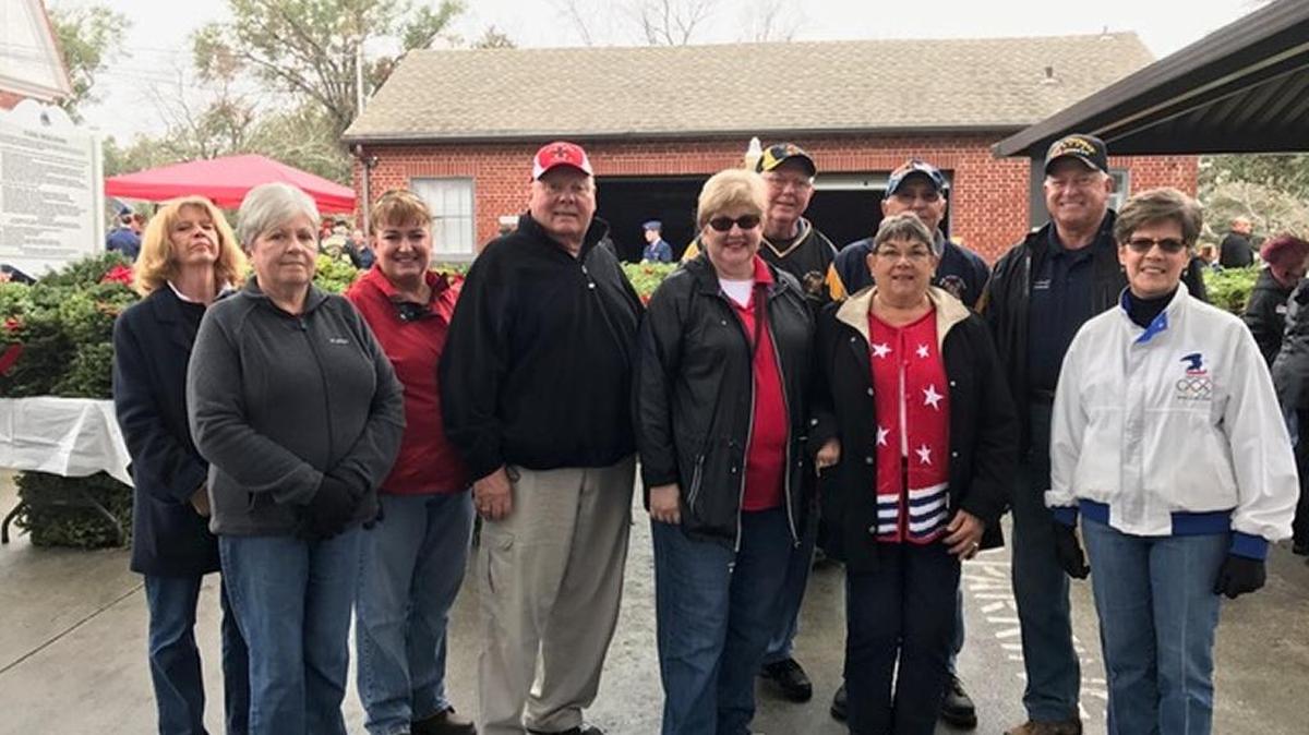 VFW Calabash Post No. 7288 members participating in the laying of the wreaths include from left to right are Lana Golden, Carol Thomas, Rose Deck, Gary Thomas, Sharon Kossler, Dan Kossler, Phyllis Banyay, Bill Hertline, Rick Arvonio, Faye Arvonio.
