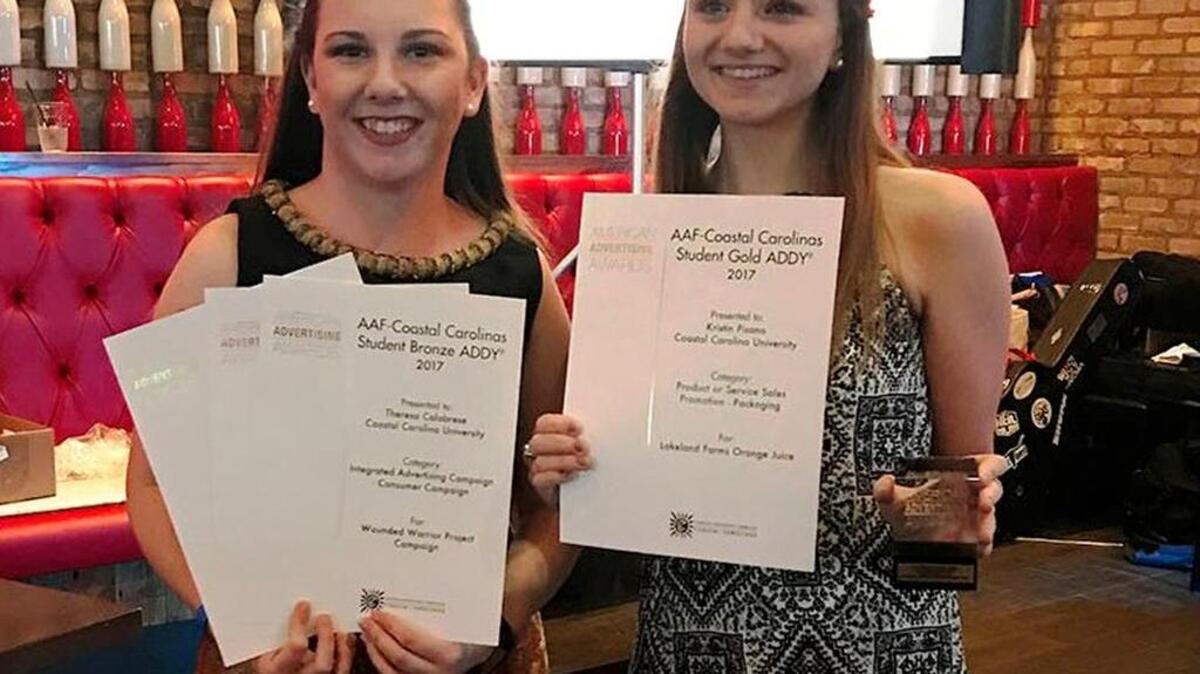 CCU student Kristin Pisano, left, won the Best of Show/Judges Choice award at the American Advertising Awards gala recently, and Theresa Calabrese, a senior, won four awards for her work in classes and university publications.