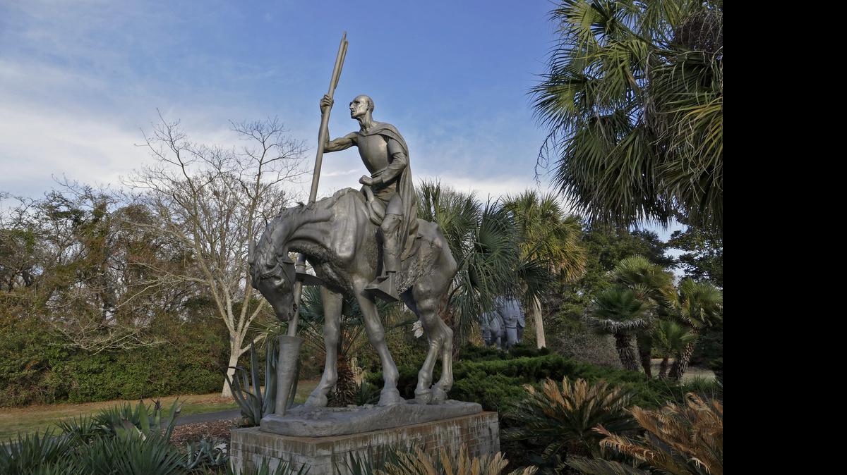 
The hard winter light lends an enhanced look of defeat to Anna Hyatt Huntington’s sculpture of Don Quixote, whom she portrays as a sad defeated figure with his lance broken after the battle. The sculpture is in the collection at Brookgreen Gardens, Murrells Inlet.
