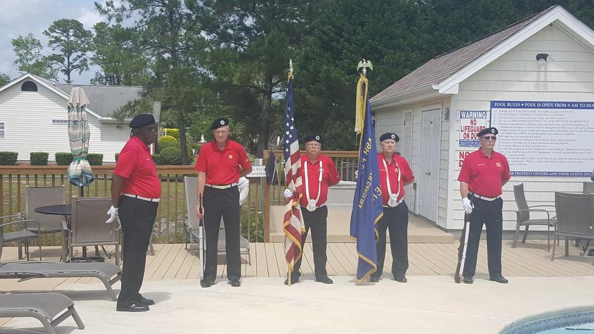 American Legion 503 Honor Guard presenting colors at Memorial Day celebration Sunday, May 22. Members are Richard Connolly, rifle, Dale Smith, U.S. flag, Bub Bradicich, Legion flag, Pete Hummer, rifle, and Capitan, Al Jackson.