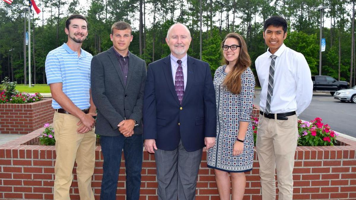 Pictured left to right, Andrew Phillips, Dylan Long, ATMC CEO O’Neal Miller, Bailey Skipper and Victor Jimenez