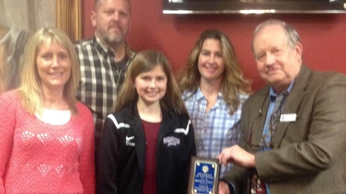 Brooklyn Wiseley is being honored by the North Myrtle Beach Optimist Club as the February Student of the Month. Brooklyn is the daughter of Trina and Thomas Wiseley and is in the seventh grade at North Myrtle Beach Middle School. Brooklyn is a member of the Junior Beta, Student Council, Rubik’s Cube Club, JV volleyball, JV soccer, FCA, and chorus. Pictured from left to right is Brenda Kidd ELA teacher, Thomas Wiseley father, Brooklyn student, Trina Wiseley mother, and Larry Dick past optimist president.