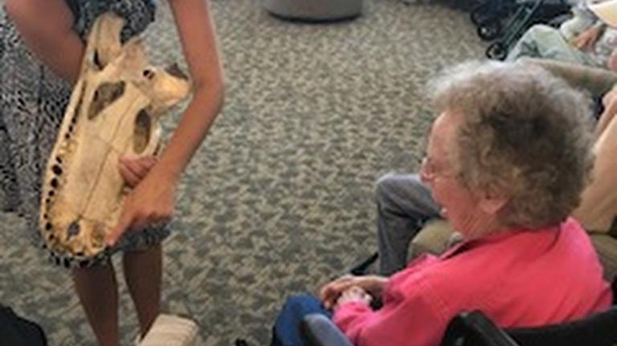 A resident of Myrtle Beach Estates reacts during a demonstration of the Brookgreen Gardens Zoological Days.