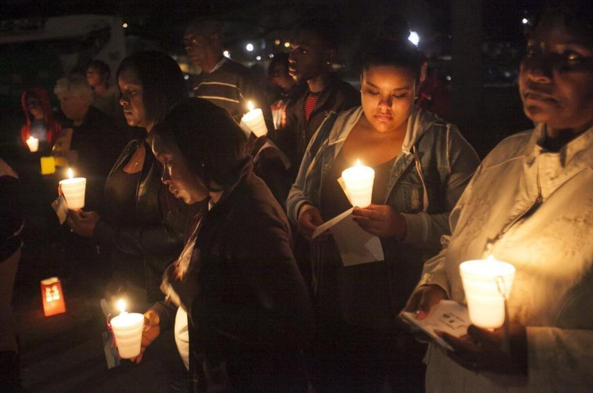 A candlelight memorial vigil for victims of gun violence was held on the steps of the old courthouse in Conway, Saturday, Dec. 17, 2016. Dozens of people came to sing and pray for the victims of violence. The event was organized by S.C. Mothers Against Violence, Inc., partners to the Horry Democrats Gun Sense committee, and Ebony's Hope.