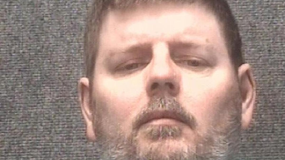 Chad Greggory Brown, 46, a cab driver with Beachside Taxi, was charged with assault and battery after a witness told police he attempted to run over a man he was arguing with Tuesday night.