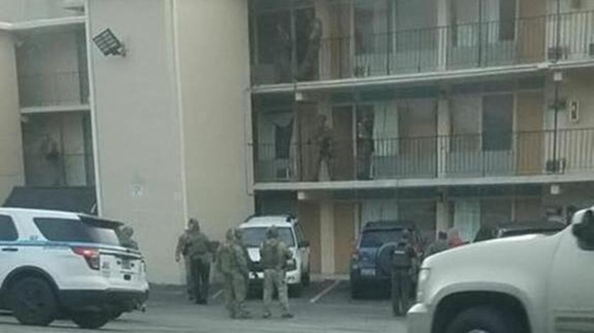 A submitted cellphone image from the Sea Banks Motor Inn shows police presence at the South Ocean Boulevard motel Tuesday morning.