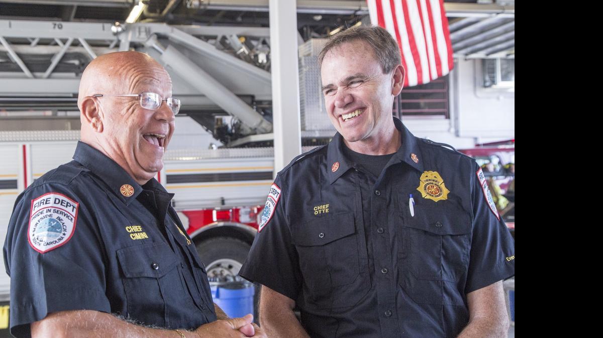 
Retired Chief Dan Cimini, who has been serving as the town's interim chief, jokes with new Chief Kevin Otte. With over 30 years of fire service in West Virginia, Kevin Otte, Surfside Beach's new fire chief will be sworn in at Surfside City Council on May 12th.
