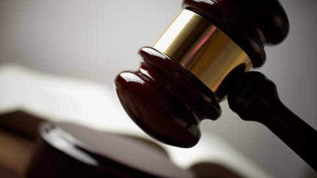 A former college football player from Virginia was sentenced to prison after he bought and sold 45 guns, including some used in shootings across the U.S., federal officials said.