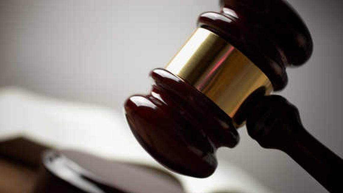 A former Simpson County court clerk was sentenced after pepper spraying a woman who fled her child custody hearing in Mississippi, federal officials say.