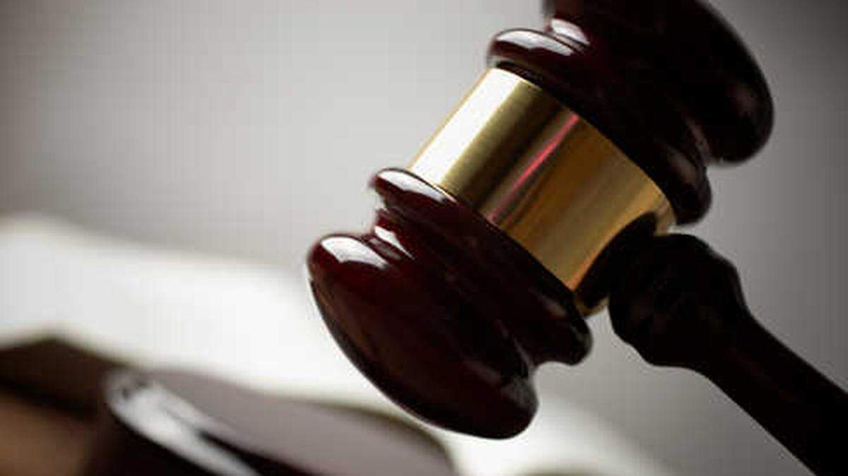 A former Simpson County court clerk was sentenced after pepper spraying a woman who fled her child custody hearing in Mississippi, federal officials say.