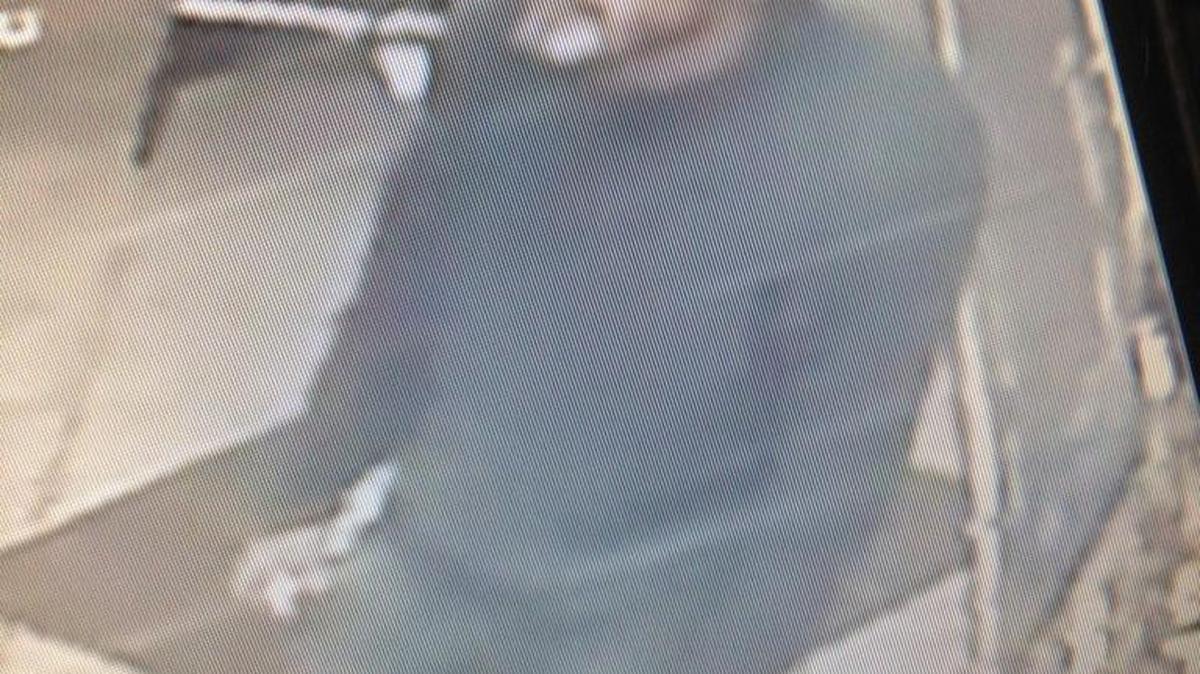 The suspect is described as a white male, 30 to 35 years old, about 5 ft. 6 in. tall with a tattoo of a possible Chinese symbol under his right eye.