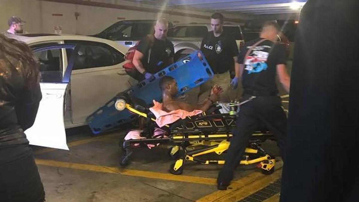 Image captured by a bystander in the parking garage of the Landmark Resort shows the apprehension of 17-year-old Derias J’Shaun Little on June 18.