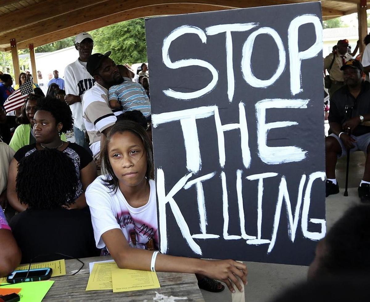 Hundreds gathered for the Community Empowerment 2015 Peace Rally at Popular Park off S.C. 90 in western Horry County on Saturday, May 9, 2015. The rally centered on finding ways to stop the violence that has left so many of the youth from the Longs community dead.