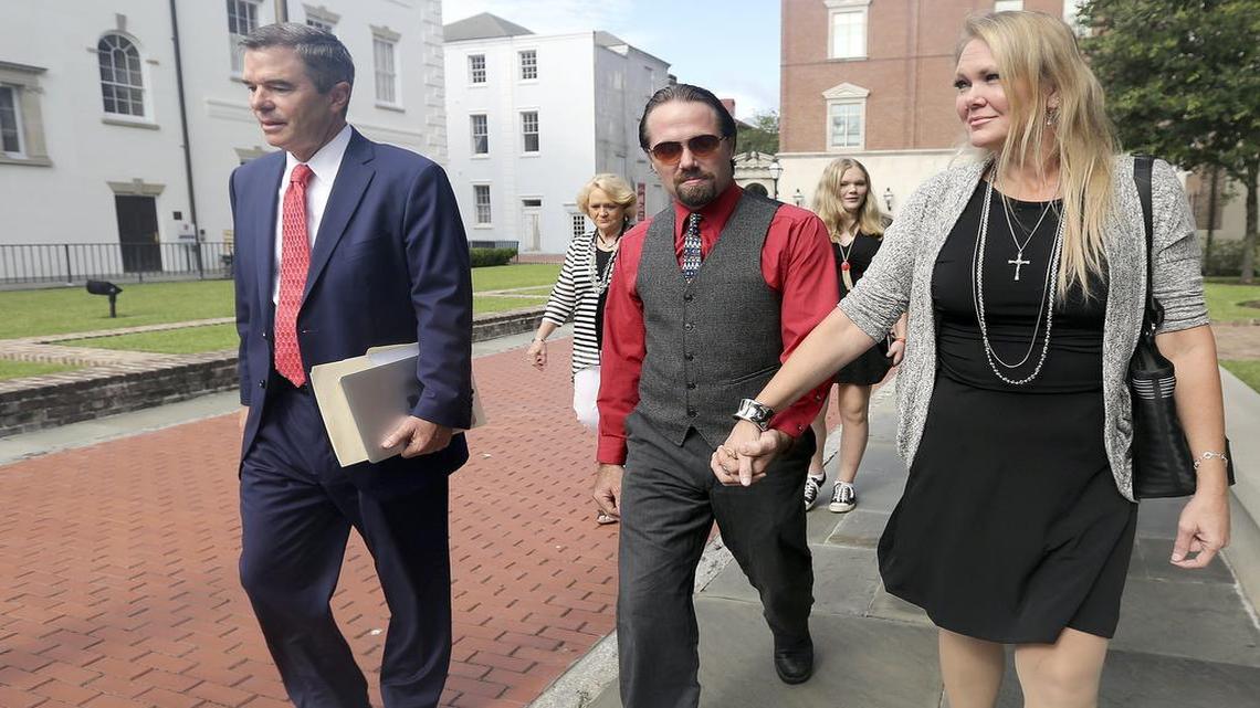 Hand in hand, Sydney and Tammy Moorer leave the courthouse in Charleston after a bond modification hearing on Thursday, Aug. 6, 2015. The couple has been allowed to travel to Orlando, Fla., for a week while Sydney Moorer is interviewing for a job in his field of restaurant maintenance. The ruling stated if he gets a job that requires him to travel to different chain restaurants the jobs must be limited to South Carolina, North Carolina and Georgia. The Moorers are charged with the murder of Heather Elvis. She was reported missing on Dec. 19, 2013, after her car was found at Peachtree boat landing. Her body has not been found. The couple was charged in February 2014. A trial date has not been set.