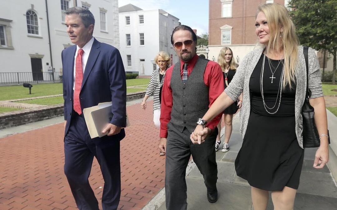 Hand in hand, Sydney and Tammy Moorer leave the courthouse in Charleston after a bond modification hearing on Thursday, Aug. 6, 2015. The couple has been allowed to travel to Orlando, Fla., for a week while Sydney Moorer is interviewing for a job in his field of restaurant maintenance. The ruling stated if he gets a job that requires him to travel to different chain restaurants the jobs must be limited to South Carolina, North Carolina and Georgia. The Moorers are charged with the murder of Heather Elvis. She was reported missing on Dec. 19, 2013, after her car was found at Peachtree boat landing. Her body has not been found. The couple was charged in February 2014. A trial date has not been set.
