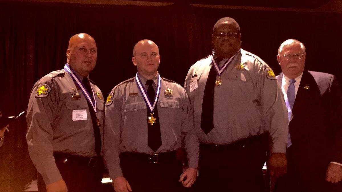Three Horry County corrections officers received S.C. Sheriff’s Association Medal of Valor awards Thursday night. Pictured are: Lt. Scott Bower (left), Officer James Thompkins, Officer Donnell Hargrove, Sheriff Phillip Thompson.