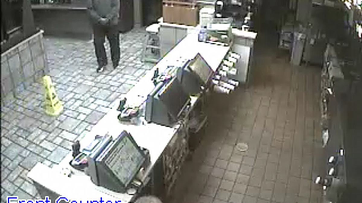 The suspect is described as black male, about 6-foot, heavy set, wearing a gray hoodie, black mask and gloves