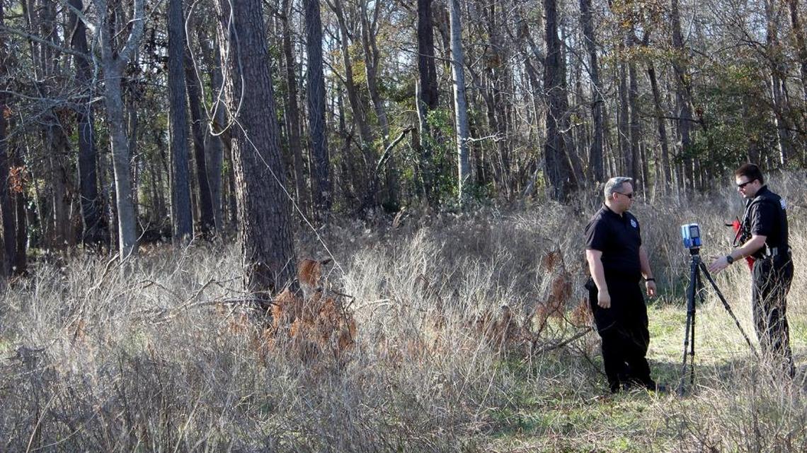 Myrtle Beach police set up a 3D laser scanner in the woods at the dead end of 27th Avenue North where the body of a young man was found lying face down. The man was dead when an officer discovered him at 11 a.m. Wednesday, Jan. 18, 2017. Officers were in the woods to scan and record the scene on Jan. 19, 2017.