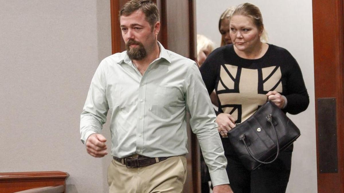 Sidney Moorer with his wife Tammy enter the courtroom for day three of the obstruction of justice trial. Moorer is charged with obstruction of justice in the 2013 disappearance of Heather Elvis. Aug. 30, 2017.