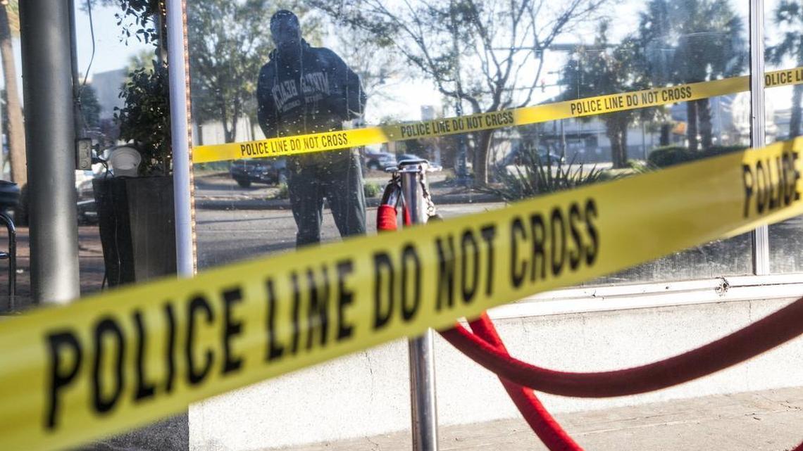 Jerry Bell, a tourist visiting Myrtle Beach from Detroit looks at the scene of a mass shooting on Saturday morning. The Pure Ultra club in downtown Myrtle Beach was the scene of a mass shooting in the early hours of Saturday morning Nov. 5, 2016. At least 5 victims were injured. Police are still investigating the incident.