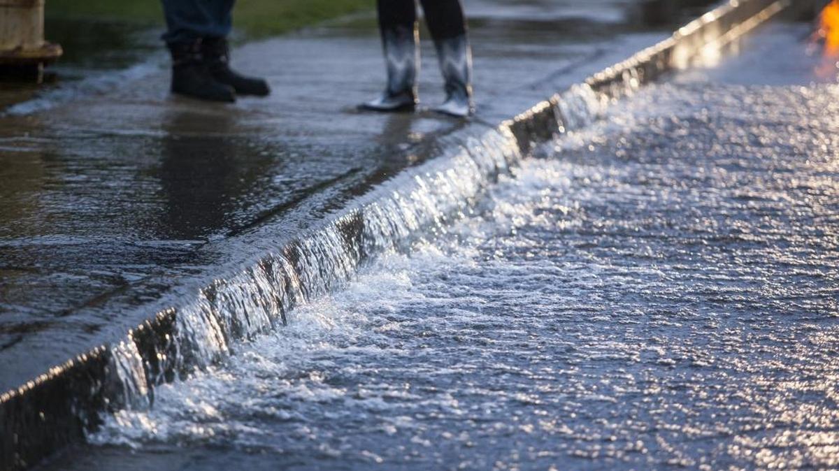 A flooded street in North Myrtle Beach begins draining after an October 2015 storm.