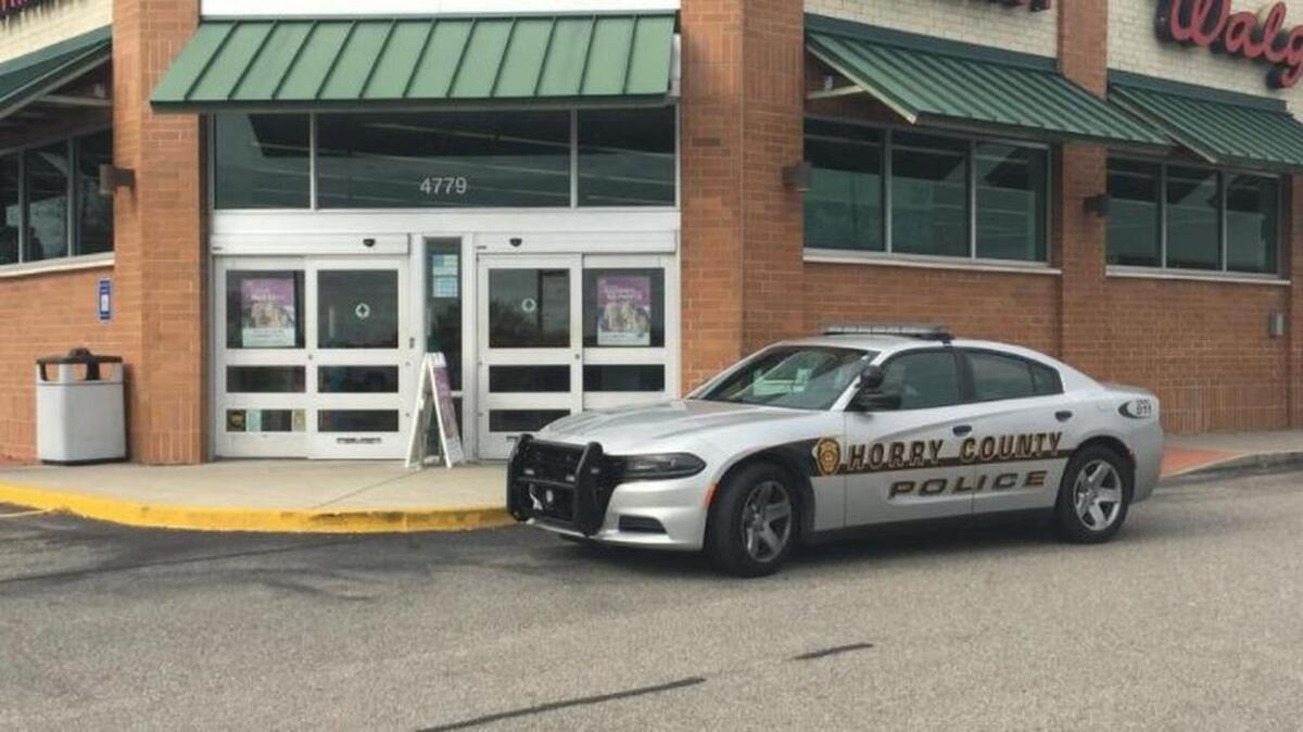 Horry County police respond to a reported robbery at Walgreens off U.S. 501 Tuesday morning.