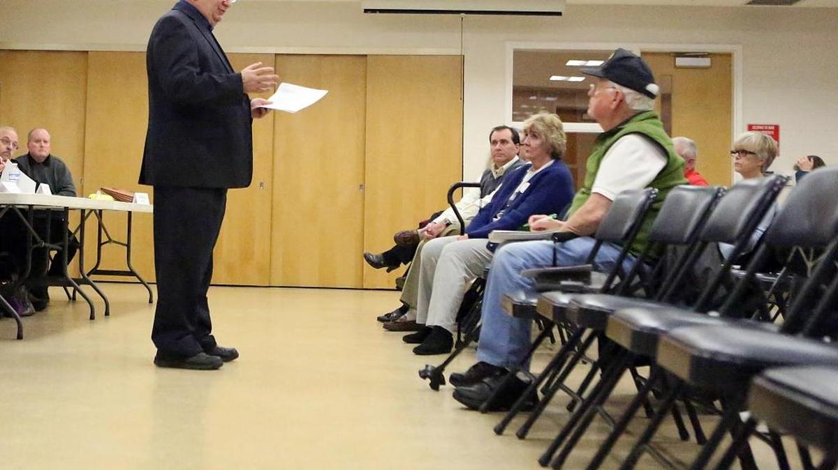 Joe DeFeo, chairman of Horry County School Board, explains reasons for hiring First Floor Energy Positive to build 5 new schools at a $540 million price tag during a meeting of the Carolina Forest Civic Association on January 20, 2016.