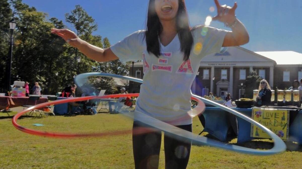 
Emilee Mullis hula hoops during the Love Your Body Day celebration at Coastal Carolina University. 
