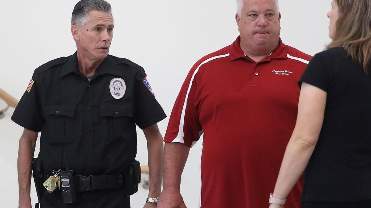 Mike Polis is the U.S. Security Associates school resource officer on the first day of school at the new Ten Oaks Middle School in the Carolina Forest community on Wednesday, Aug. 23, 2017.