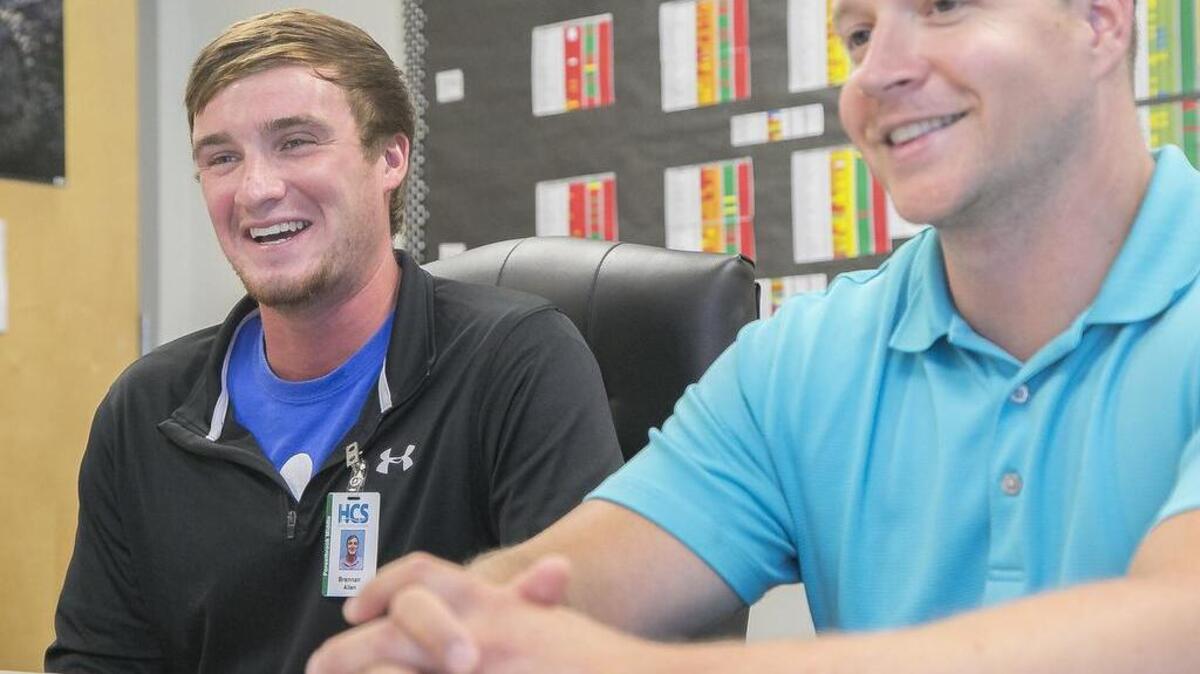 
Brennan Allen (left), a first year teacher at Forestbrook Middle School, talks with his mentor, Ben Pretzloff, about the anticipation of a new school year. Forestbrook Middle School teachers are back in school making preparations for their students’ arrival Thursday.
