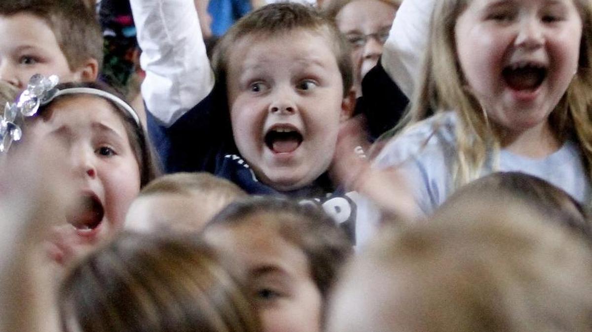 Midland Elementary School students cheer as their school wins the Palmetto's Finest award on Wednesday, March 26, 2014. Midland Elementary will soon be renovated after the Board of Education awarded contracts