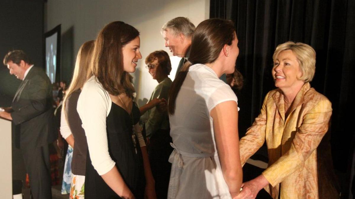 Socastee High School honor students Taryn Perry (right) and Briana Ply are congratulated by Kay Loftus, Horry County Board of Education District #4. Loftus, who represented district 4, passed away Feb. 29 at the age of 66. She served on the board for 14 years.