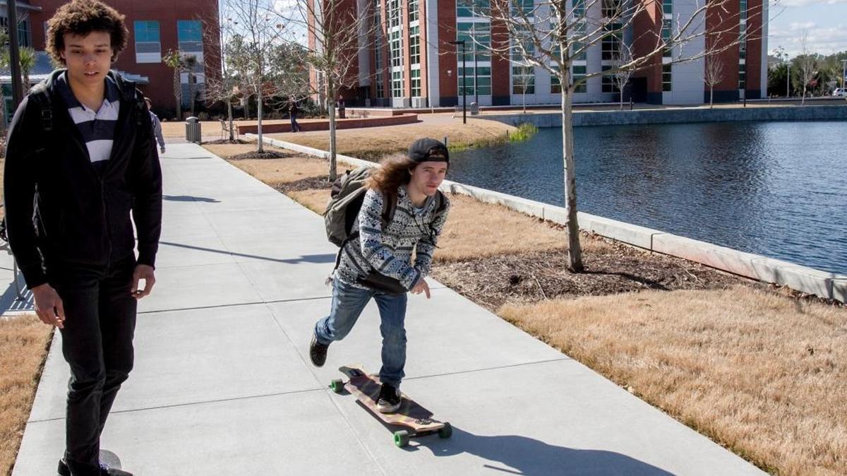 Students skateboard between classes on the Horry Georgetown Technical College Campus. The college’s Board of Commissioners raised tuition by about 3 percent for the fall semester.