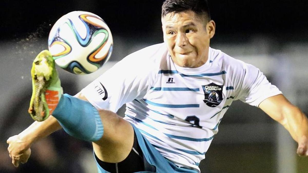 
Coastal Carolina University's Joel Perez (9) passes in the match with High Point on Nov. 5, 2014. CCU’s Board of Trustees Finance Committee approved the first step to construct a new soccer complex on campus at their meeting Thursday morning. 
