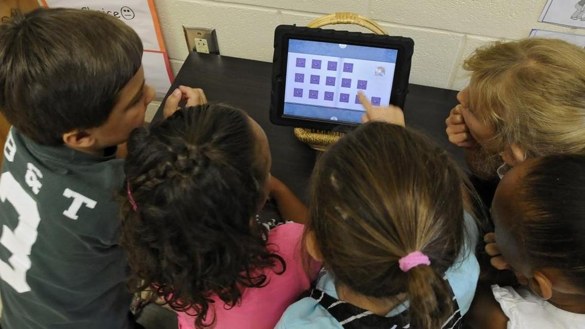 Burgess Elementary first graders take turns playing a matching game. Horry County Schools is working with state and federal investigators to determine exactly what to do about a computer virus that affected several servers across the district.