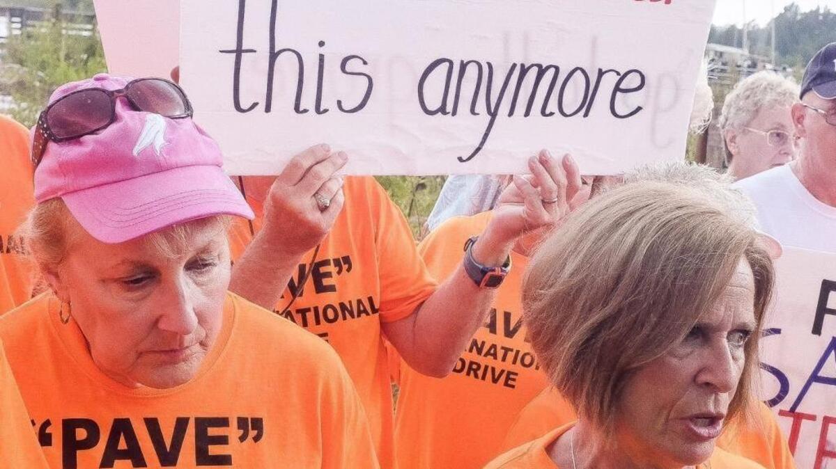 Advocates for paving International Drive in Conway protested the Coastal Conservation League offices in August.